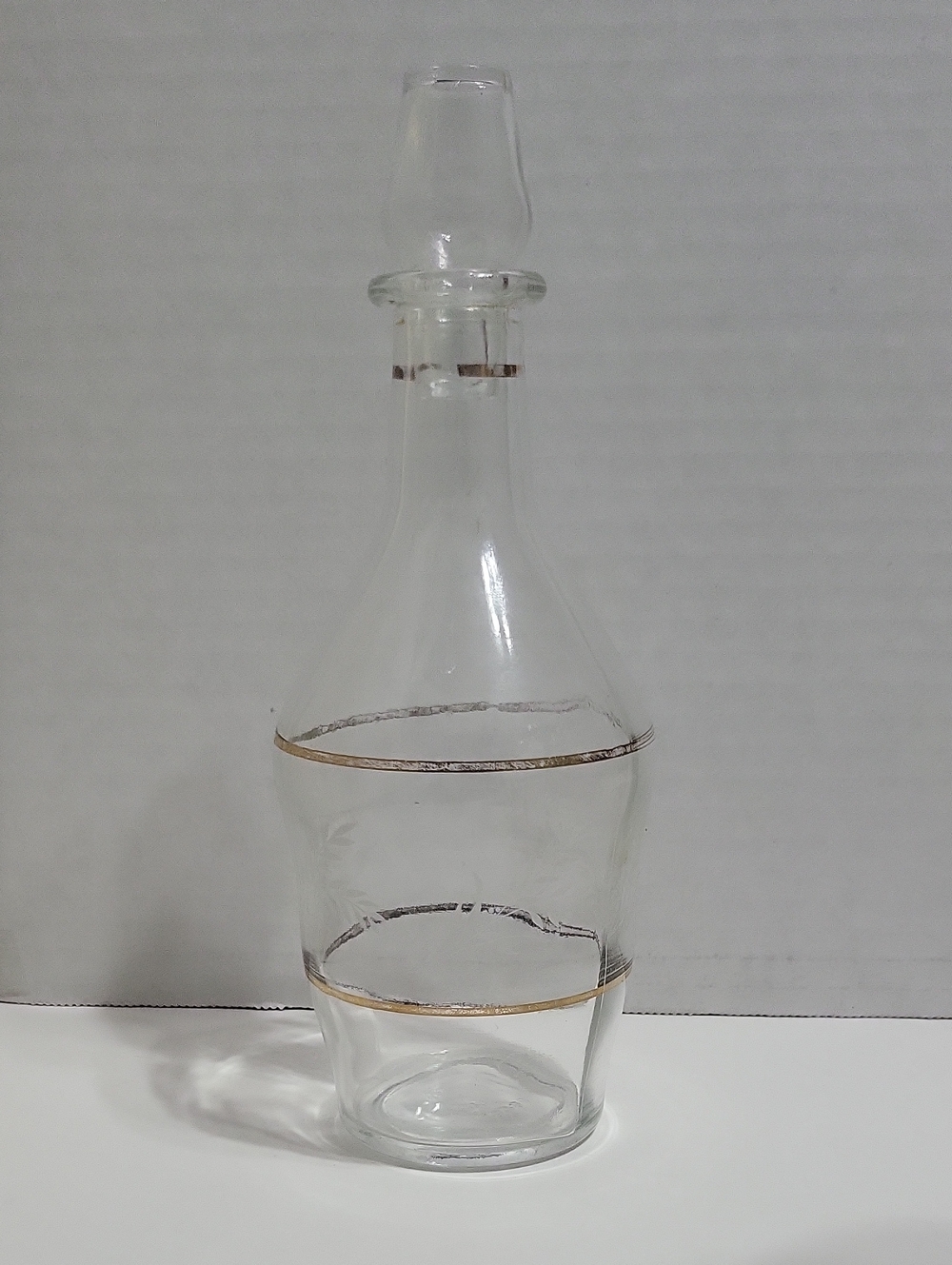 Clear Glass Decanter with Gold Accent and Etching.